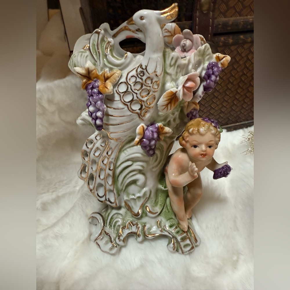 Vintage Believed to be a “Noritake vase, peacock and cherub motif” ??